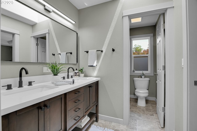 2805 Knox Ridge Ter, Forest Grove, OR 97116 - bathroom with double vanity and stone finish flooring