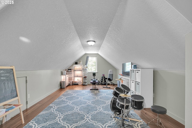 2805 Knox Ridge Ter, Forest Grove, OR 97116 - home office featuring a textured ceiling, lofted ceiling, and wood finished floors