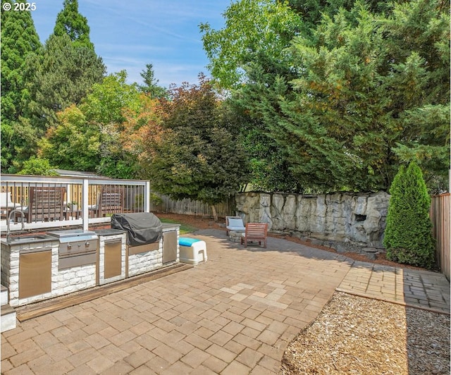 2805 Knox Ridge Ter, Forest Grove, OR 97116 - fenced backyard with area for grilling and a patio