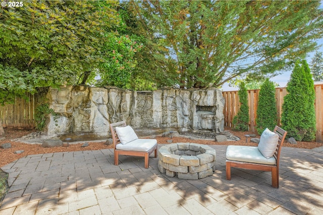 2805 Knox Ridge Ter, Forest Grove, OR 97116 - fenced backyard featuring a patio area and an outdoor fire pit
