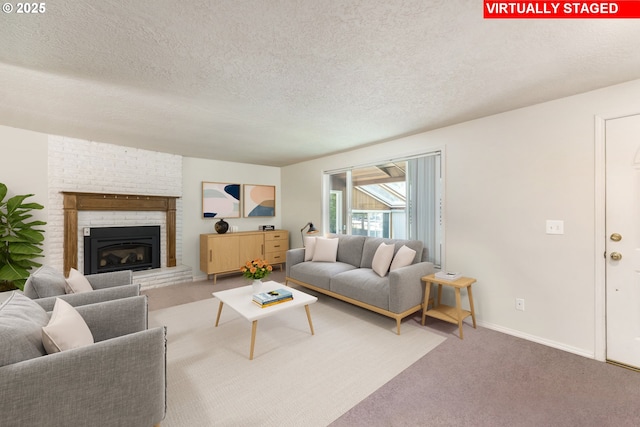 carpeted living room featuring a brick fireplace, baseboards, and a textured ceiling