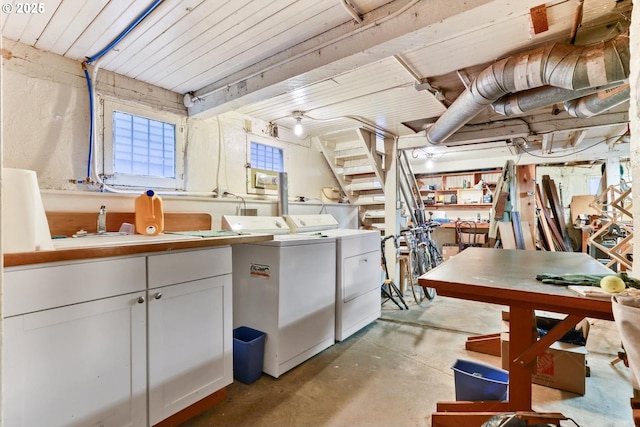 basement with washing machine and clothes dryer