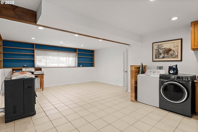 clothes washing area featuring washer and clothes dryer, recessed lighting, baseboards, and light tile patterned flooring