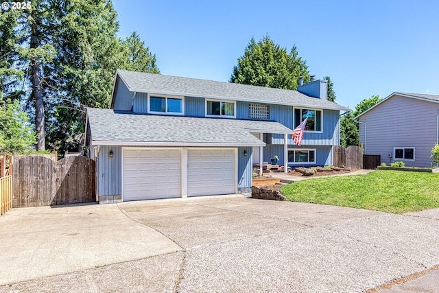 split foyer home with a chimney, driveway, an attached garage, a gate, and a shingled roof
