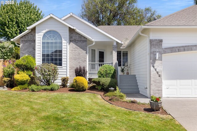 ranch-style home with an attached garage, a front lawn, brick siding, and roof with shingles