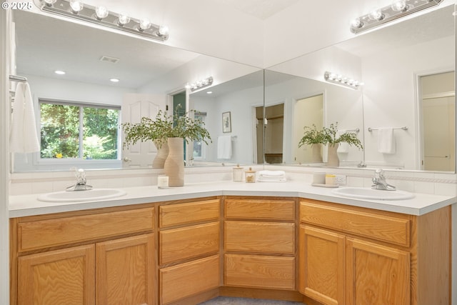 full bathroom with double vanity
