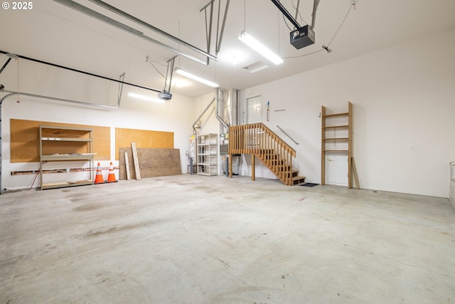laundry room featuring cabinet space, independent washer and dryer, and light tile patterned flooring