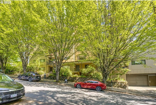 2021 SW Main St Unit 66, Portland, OR 97205 - view of property hidden behind natural elements