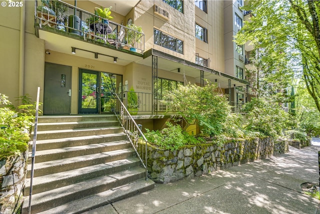2021 SW Main St Unit 66, Portland, OR 97205 - property entrance featuring stucco siding