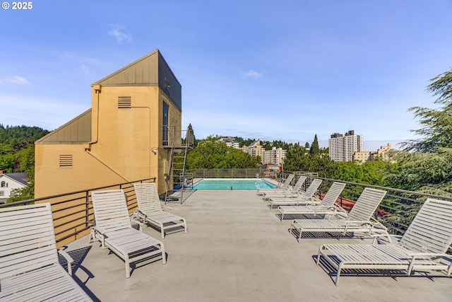 2021 SW Main St Unit 66, Portland, OR 97205 - community pool featuring a patio area