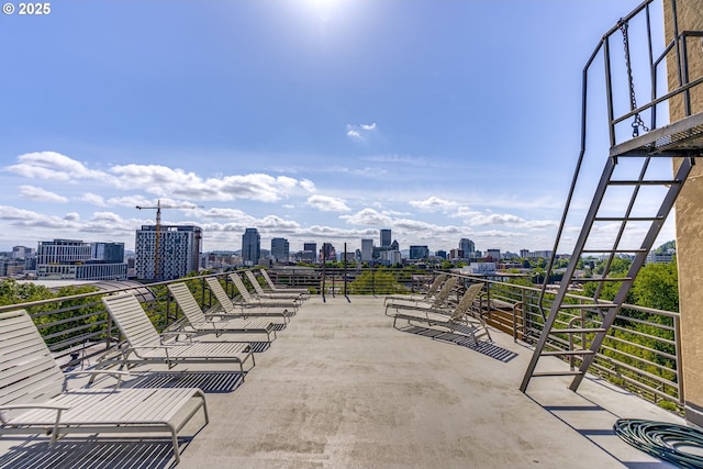 2021 SW Main St Unit 66, Portland, OR 97205 - view of patio with a view of skyline