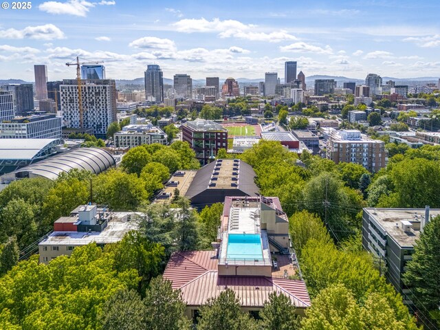 2021 SW Main St Unit 66, Portland, OR 97205 - bird's eye view of a pool area and skyline