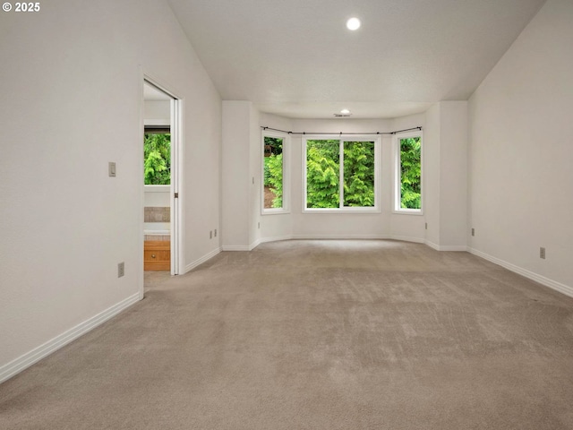 3165 SW Garden View Ave, Portland, OR 97225 - carpeted spare room with plenty of natural light, baseboards, and recessed lighting
