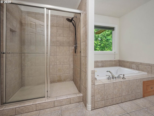 3165 SW Garden View Ave, Portland, OR 97225 - full bath featuring a stall shower, a garden tub, and tile patterned flooring