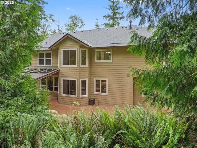 3165 SW Garden View Ave, Portland, OR 97225 - rear view of house featuring roof with shingles