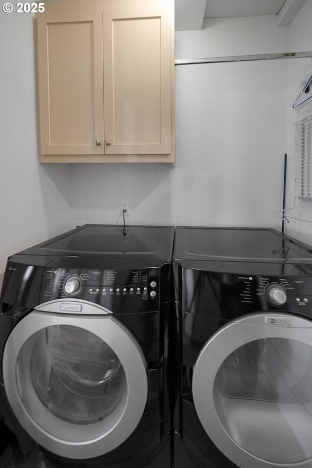 93885 Boulder Pl, Gold Beach, OR 97444 - washroom with separate washer and dryer and cabinet space