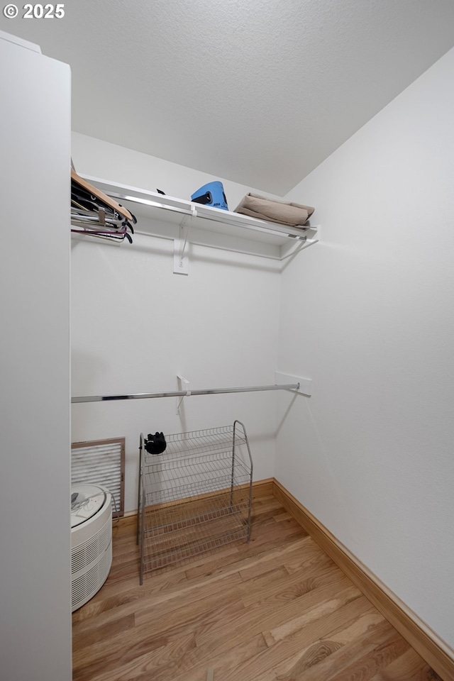 93885 Boulder Pl, Gold Beach, OR 97444 - walk in closet featuring wood finished floors