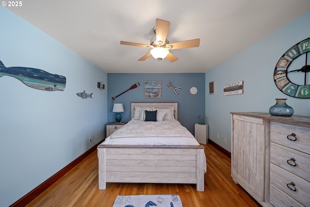 93885 Boulder Pl, Gold Beach, OR 97444 - bedroom featuring a ceiling fan, baseboards, and light wood-style flooring
