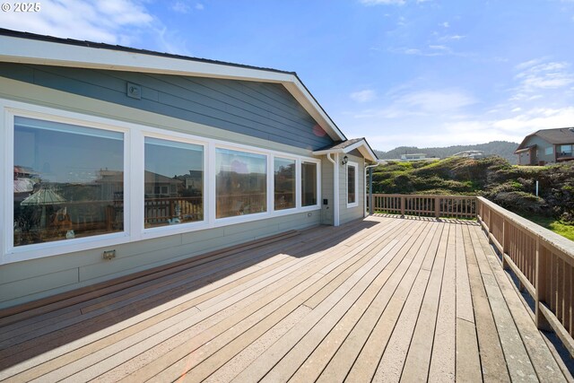 93885 Boulder Pl, Gold Beach, OR 97444 - wooden terrace featuring a mountain view