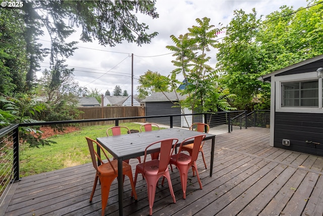 deck featuring outdoor dining area