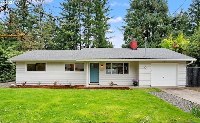 single story home featuring an attached garage, a front yard, a chimney, and concrete driveway