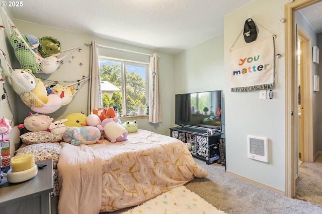 4000 NE 109th Ave Unit 169, Vancouver, WA 98682 - carpeted bedroom featuring heating unit and baseboards