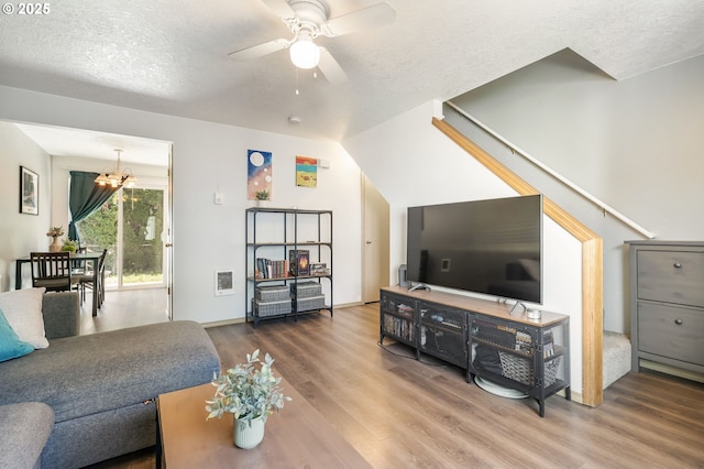 4000 NE 109th Ave Unit 169, Vancouver, WA 98682 - living room featuring wood finished floors, ceiling fan, a chandelier, and a textured ceiling