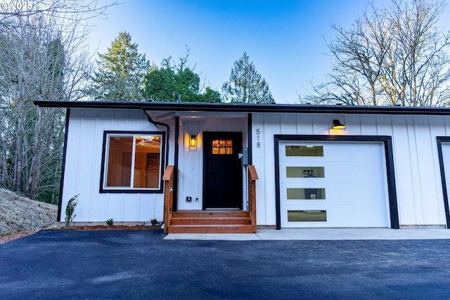 view of front of property featuring a garage