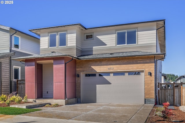 16537 SE Shimmering Leaf St, Happy Valley, OR 97086 - contemporary home with a garage, concrete driveway, and a shingled roof