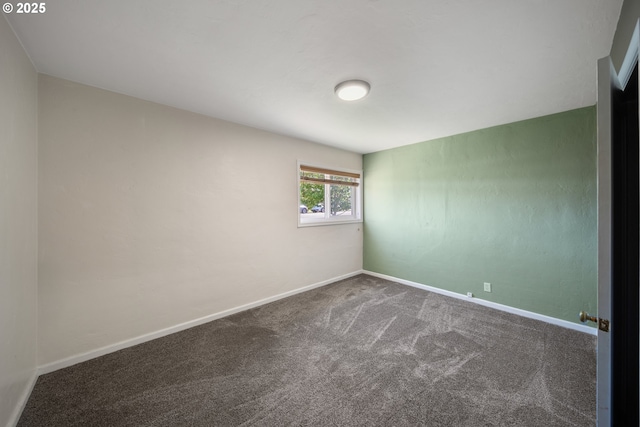 2111 Greenwood Ave, Reedsport, OR 97467 - empty room with carpet floors and baseboards