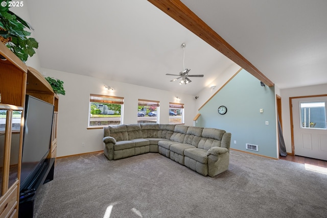 2111 Greenwood Ave, Reedsport, OR 97467 - living area with carpet floors, baseboards, and a ceiling fan