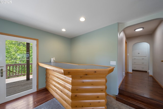 2111 Greenwood Ave, Reedsport, OR 97467 - bar area featuring hardwood / wood-style floors, arched walkways, baseboards, and recessed lighting