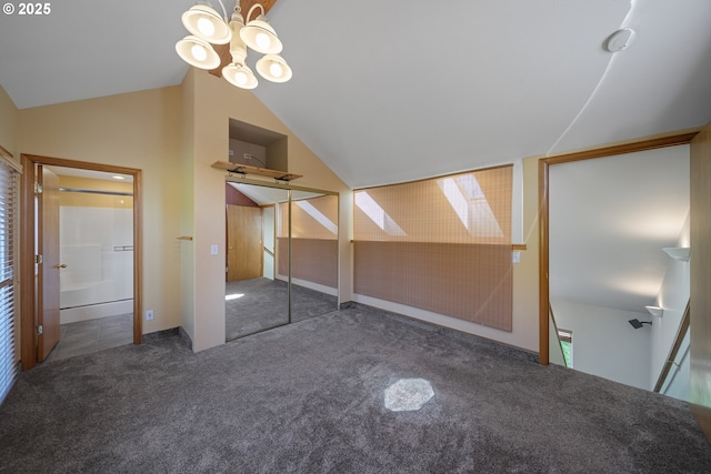 2111 Greenwood Ave, Reedsport, OR 97467 - unfurnished bedroom featuring carpet flooring, vaulted ceiling, and a chandelier