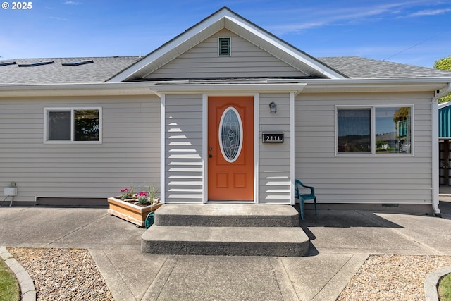 2111 Greenwood Ave, Reedsport, OR 97467 - doorway to property featuring roof with shingles