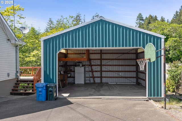 2111 Greenwood Ave, Reedsport, OR 97467 - garage featuring freestanding refrigerator