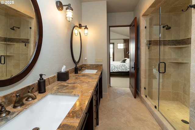 23021 Brushline Ct, Bend, OR 97701 - bathroom featuring ensuite bathroom, a stall shower, double vanity, and tile patterned floors
