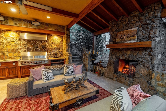 23021 Brushline Ct, Bend, OR 97701 - view of patio with exterior kitchen and an outdoor living space with a fireplace
