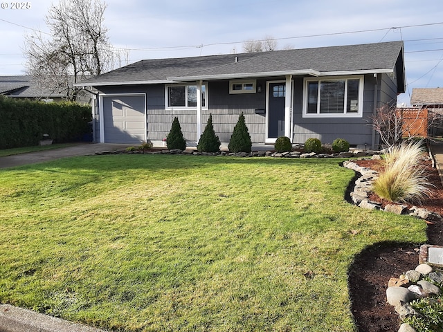 ranch-style home with a garage and a front yard