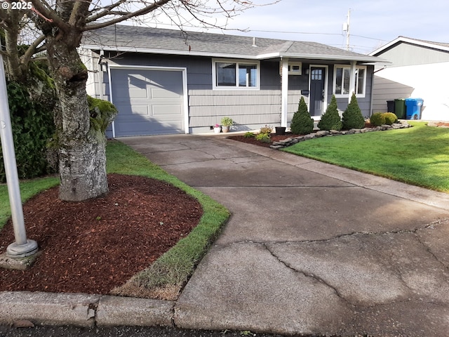 ranch-style house with a front yard and a garage