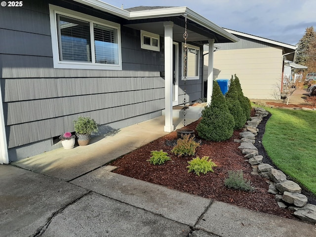 view of home's exterior with a lawn