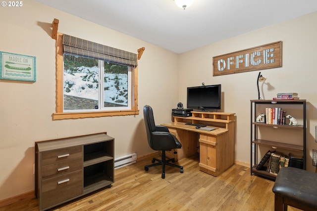 10256 Ridgeview Ter, Birkenfeld, OR 97016 - home office with a baseboard radiator, light wood-style floors, and baseboards