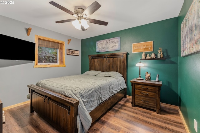 10256 Ridgeview Ter, Birkenfeld, OR 97016 - bedroom with baseboards, wood finished floors, and a ceiling fan