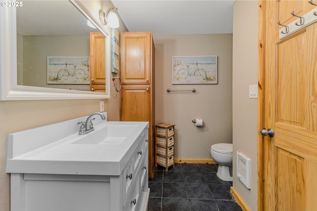 10256 Ridgeview Ter, Birkenfeld, OR 97016 - bathroom with toilet, vanity, and baseboards