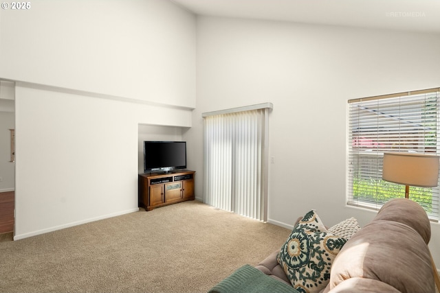 4744 SE Maxwell St, Hillsboro, OR 97123 - living room featuring high vaulted ceiling, carpet flooring, and baseboards