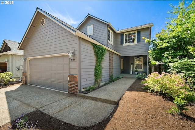 4744 SE Maxwell St, Hillsboro, OR 97123 - view of front of home with a garage and concrete driveway