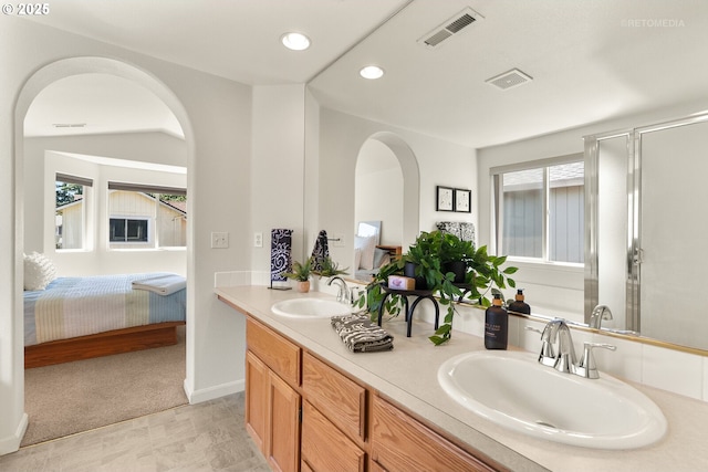 4744 SE Maxwell St, Hillsboro, OR 97123 - bathroom with ensuite bath, double vanity, recessed lighting, and a shower with door