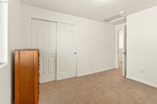 4744 SE Maxwell St, Hillsboro, OR 97123 - unfurnished bedroom featuring carpet, a closet, baseboards, and attic access