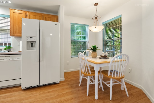 4744 SE Maxwell St, Hillsboro, OR 97123 - dining area featuring light wood finished floors and baseboards
