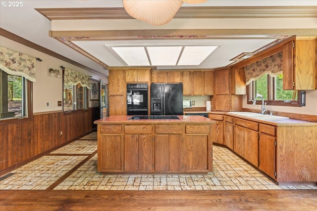 4700 NE 343rd St, La Center, WA 98629 - kitchen with a sink, tile countertops, black appliances, brick patterned floor, and a kitchen island