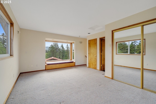 8095 Bewley St, Bay City, OR 97107 - unfurnished bedroom featuring carpet floors and multiple windows
